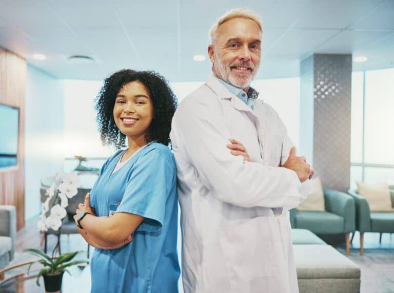 Healthcare team, doctor and nurse with portrait, medical professional and collaboration with divers